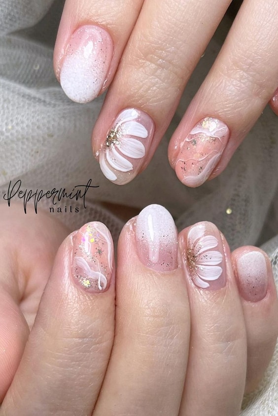 Soft Pink Almond Nails with Cute Floral Design