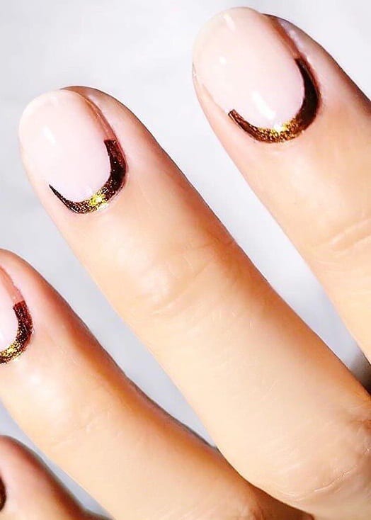 Ever spotted these kind of manicure? A Reverse Manicure is the reverse take on the Famous French and highlights the lower part of your nail known as the half moon. #reverse #manicure #nailart #naildesigns