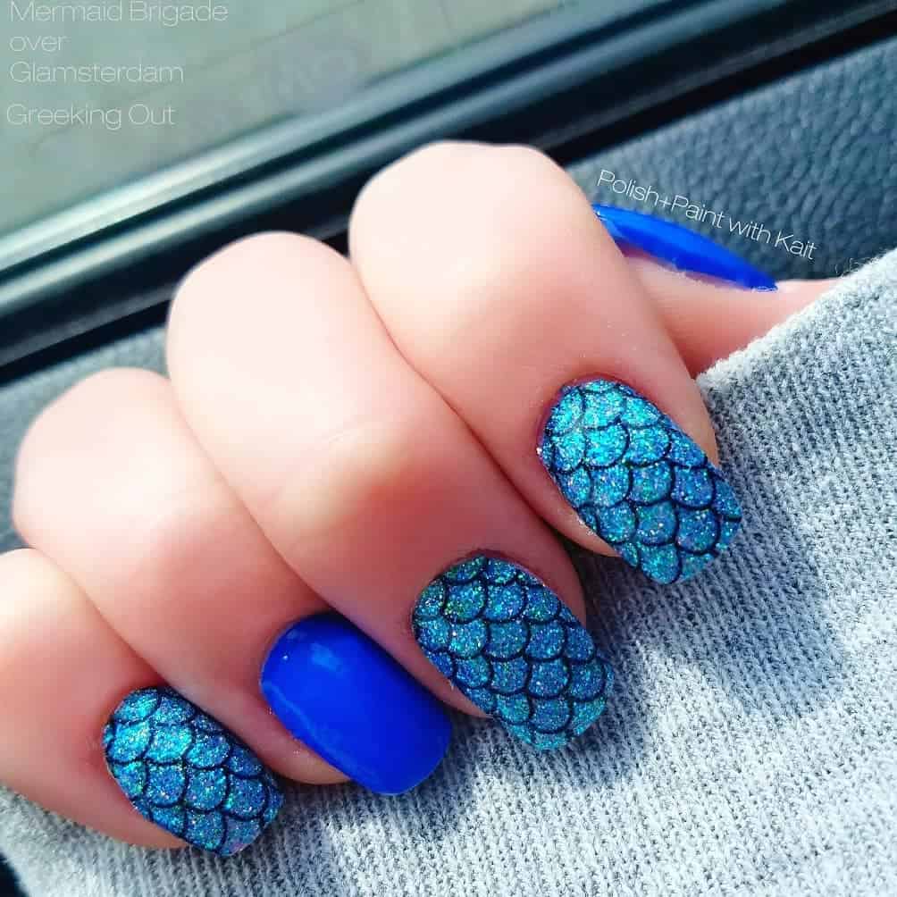 If you love Sea or Oceans then you should try Mermaid Nails. Designs like scales pattern of a mermaid's tail or as simple as a clamshell and starfish. See our post for more nail design ideas for mermaid lovers #ocean #sea #mermaid #lover #nail #nailart #naildesign 