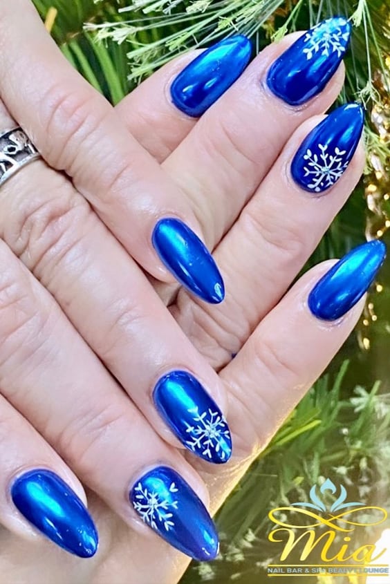 Blue Chrome Nails With White Flowers Design