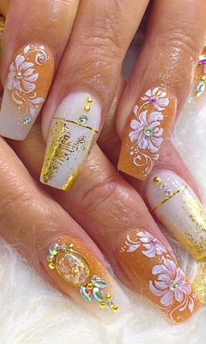 Floral Nails With Multiple Pop of Colors and Gold Foils