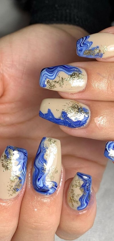Nude Beige Nails With Blue Marble Design And Gold Foil