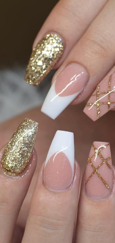 Nude Nails And Gold Glitters With French Tips Combination