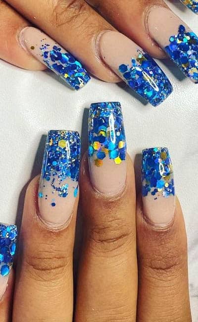 Nude Ombre Nails With Blue And Gold Glitters