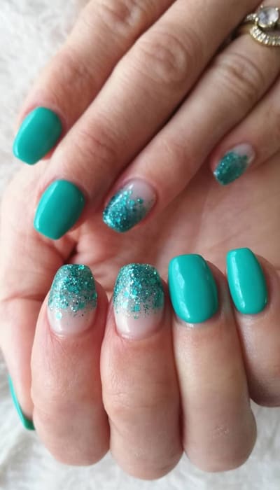 These ombre nails are perfect for any occasion and can't go wrong! From a disco ball, galaxy nails, to a winter wonderland look these designs will make your nails stand out from the crowd. #glitterombrenails #glitterombreailart #glitterombrenaildesigns #glitterombreacrylicnails