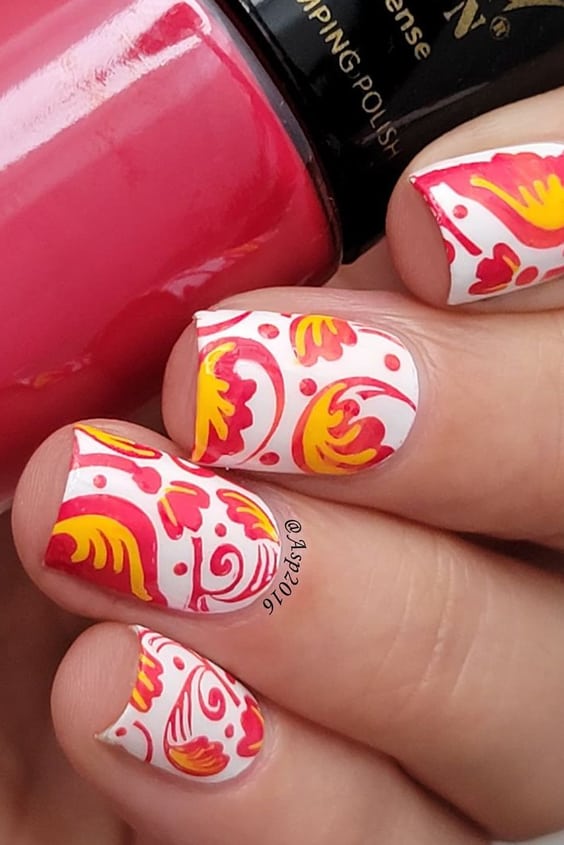 Red & Orange Stamped Paisley Nails with White as Base