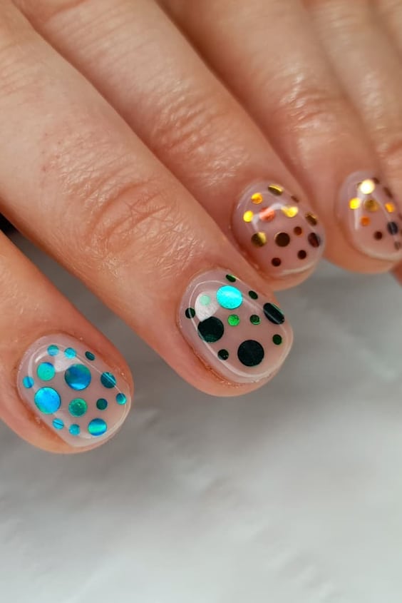 Nail art is not just a trend. It's a way of expressing yourself and embracing your creativity. In this blog post, you'll see 24 different nail designs that will make you smile. You'll learn how to create each design with the right tools and materials so that it's easier for you to try them out at home! #rainbownails #rainbownailart #rainbownaildesigns #rainbowacrylicnails