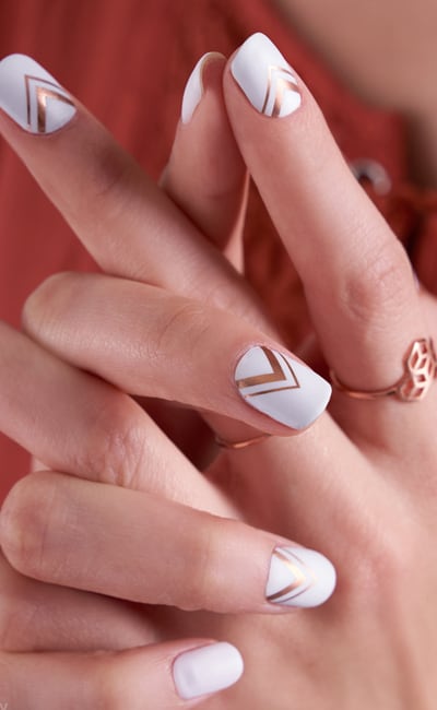 White Nails With Rose Gold Chevron Pattern