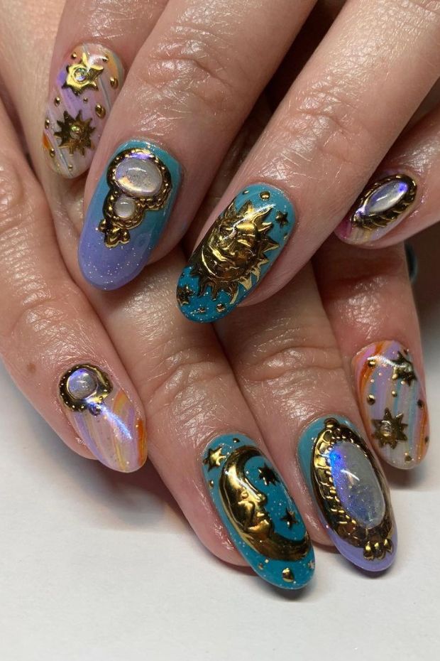 Golden hues bringing celestial vibes, as the sun and moon dance upon my nails. Nailing that cosmic elegance!