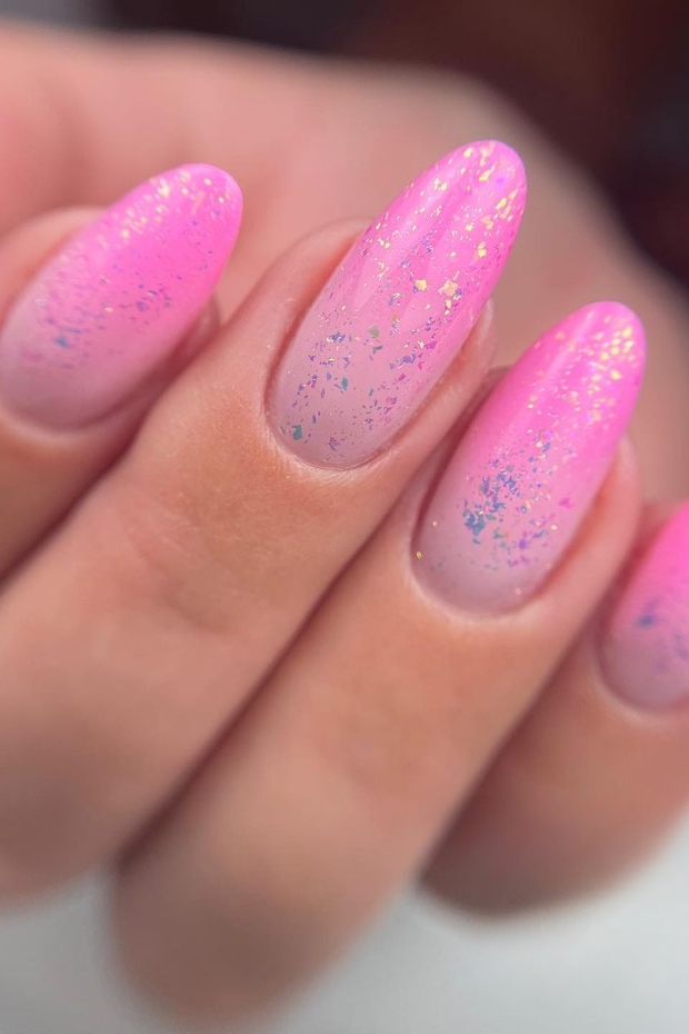 Close-up of a set of Ombre Almond Nails showcasing a gradual color transition from dark to light shades