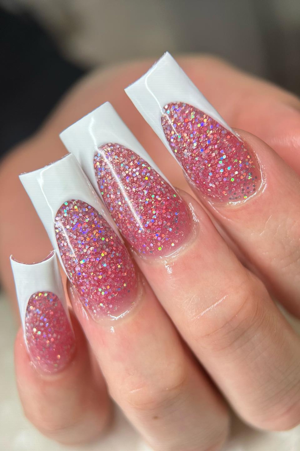 Looking to add some sparkle to your French tips? Check out these 25 dazzling glitter designs that will take your manicure to the next level! #nailart #glittertips #frenchmanicure #nailinspiration #sparklynails