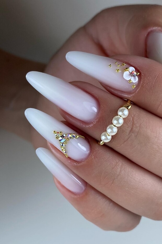 Get inspired with these stunning 25 wedding nail ideas! From intricate designs for the bride to simple yet elegant styles for bridesmaids, find the perfect bridal nail inspiration. #WeddingNails #Bride #Bridesmaid #BridalNails #NailDesign