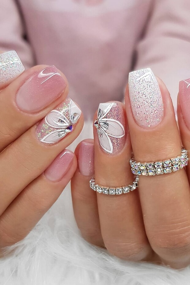 Get inspired with these stunning 25 wedding nail ideas! From intricate designs for the bride to simple yet elegant styles for bridesmaids, find the perfect bridal nail inspiration. #WeddingNails #Bride #Bridesmaid #BridalNails #NailDesign