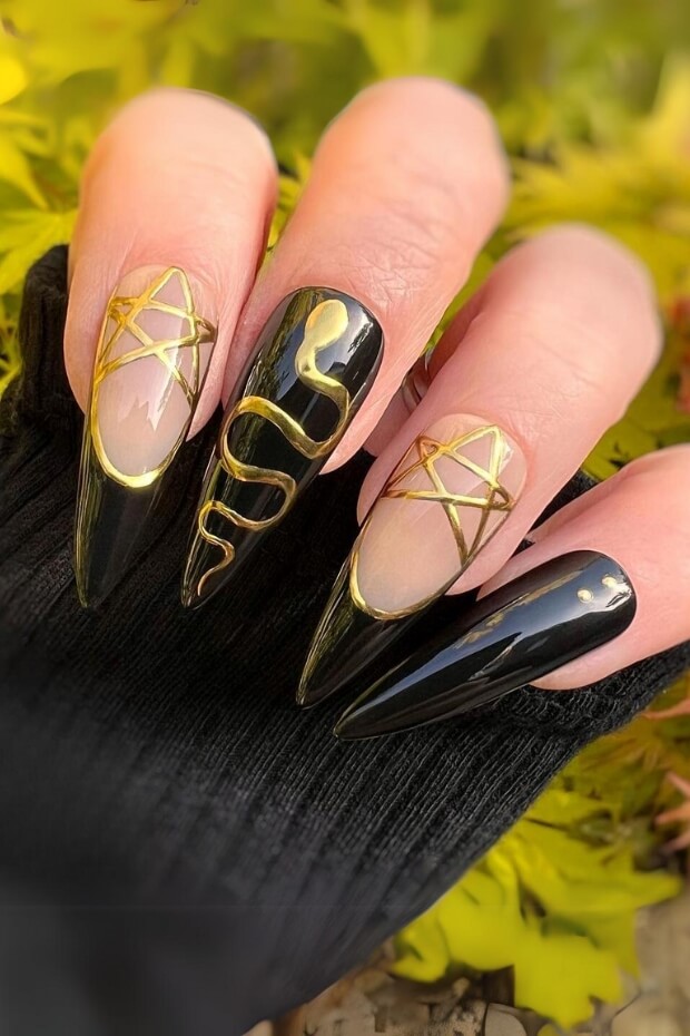 Black Stiletto Nail with Gold Snake Pattern