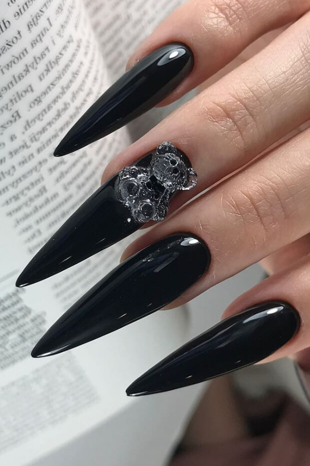Black Stiletto Nail with Shimmering Stone