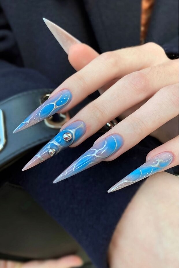 Blue and White Stiletto Goth Nails with Silver Accents