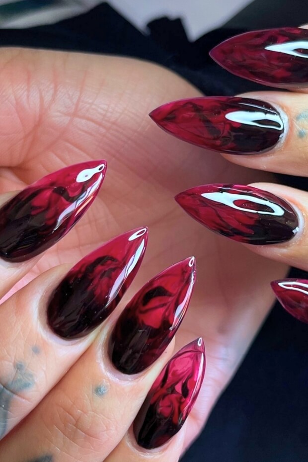 Dark Red and Black Marble-like Stiletto Goth Nails