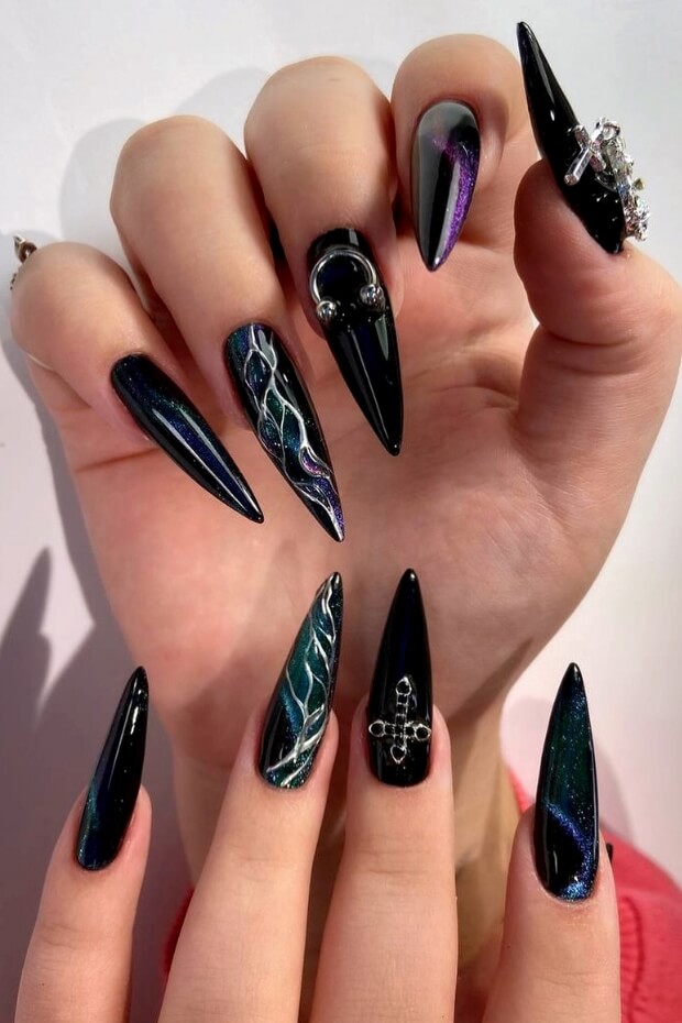 Dark and Edgy Black and Purple Stiletto Goth Nails with Crosses and Stars