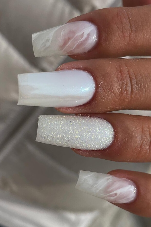 Glittery white marble nail design