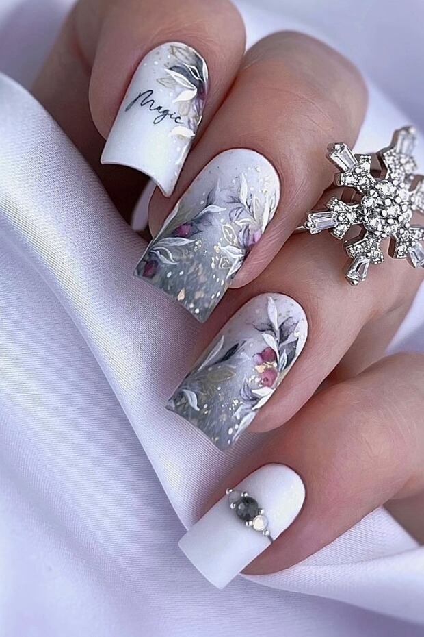 Intricate floral pattern in silver and white colors