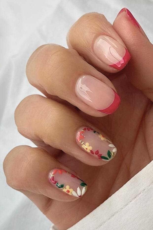 Vibrant floral nail art with pink and white