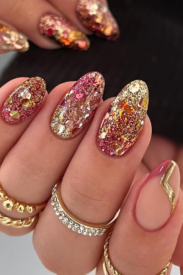 Gold and pink glittery nail art
