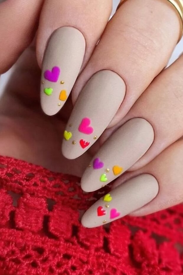 Colorful hearts nail art design