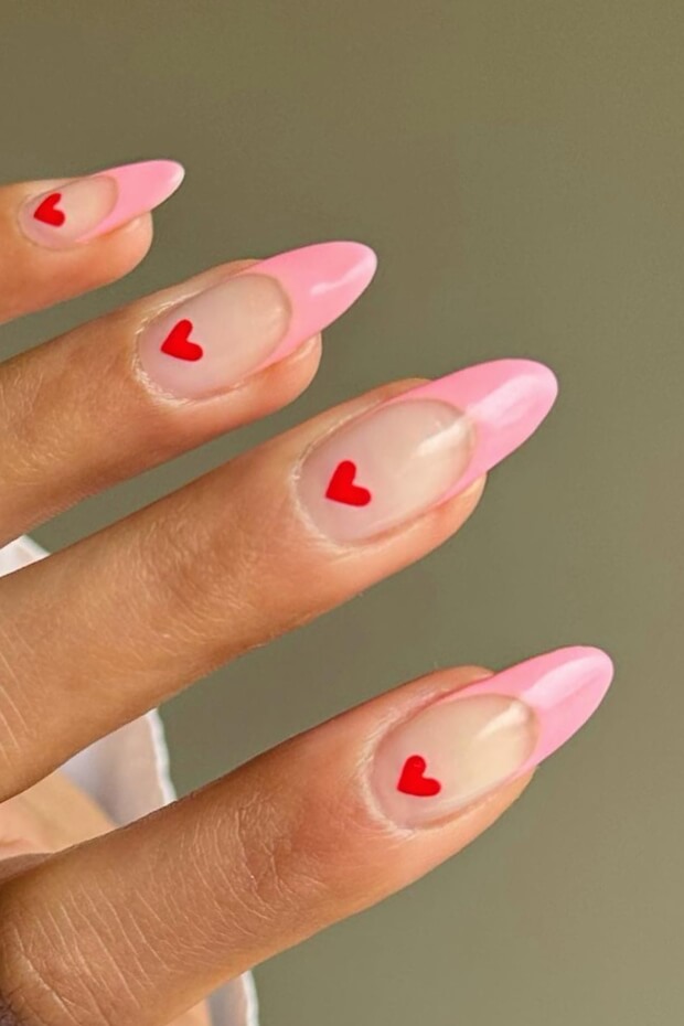 Pink tips and red hearts on French tips