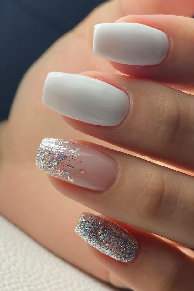 White and silver glittery nail art design