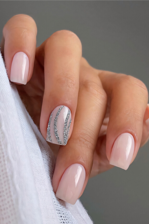 Elegant Pink Nails with Silver Wavy Pattern