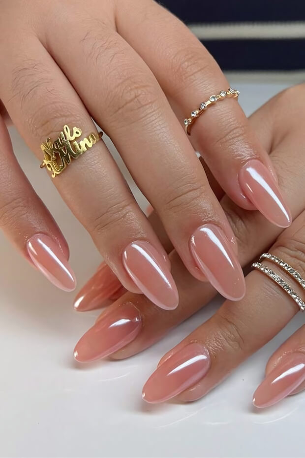 Glossy chrome finish pink stiletto nail design