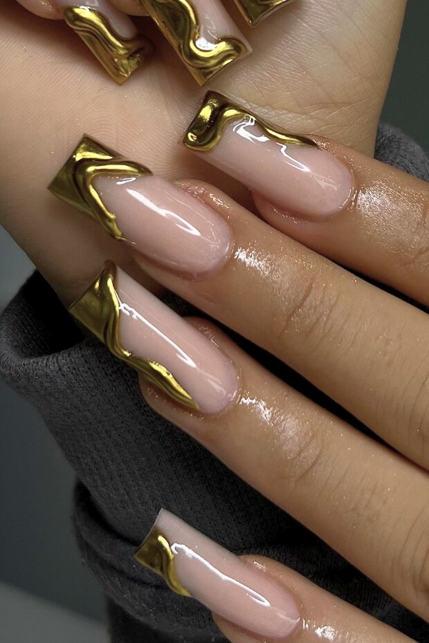 Gold foil accents on nail tips