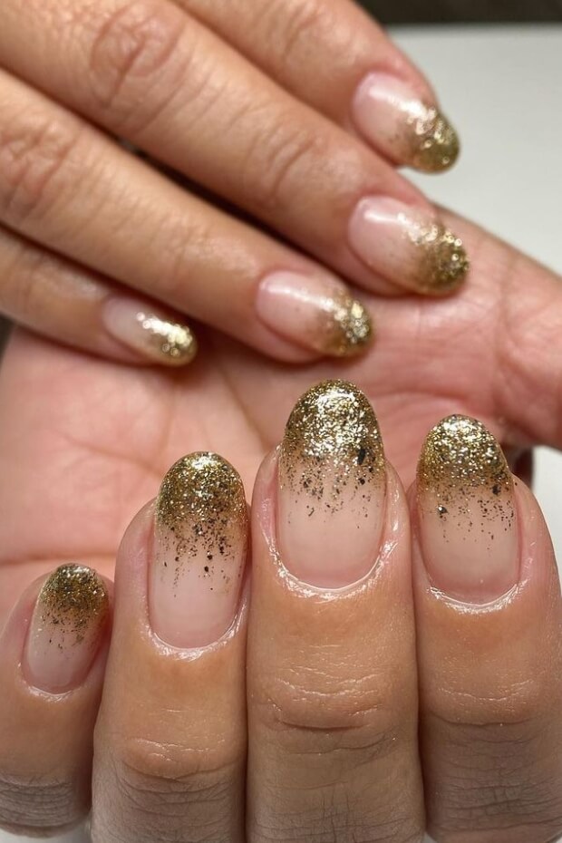 Gold glitter and ombre effect nail art design