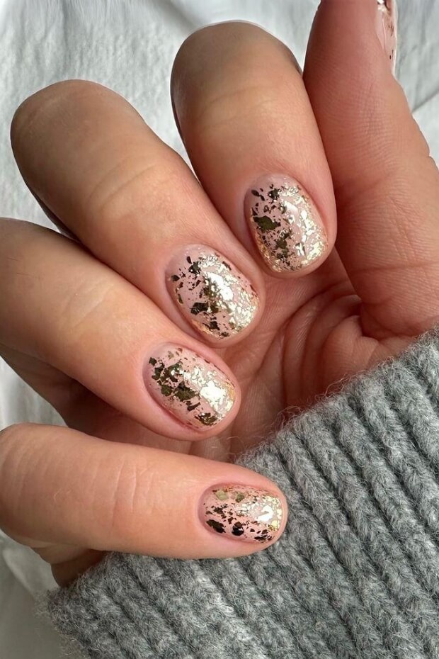 Gold leaf and pink background nail art design