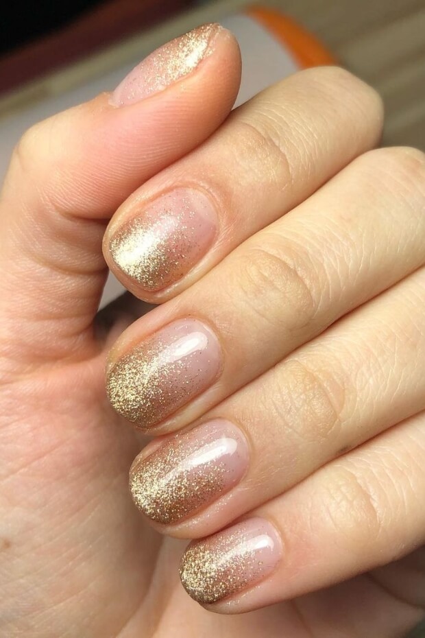 Gold ombre effect with white gradient nail art design