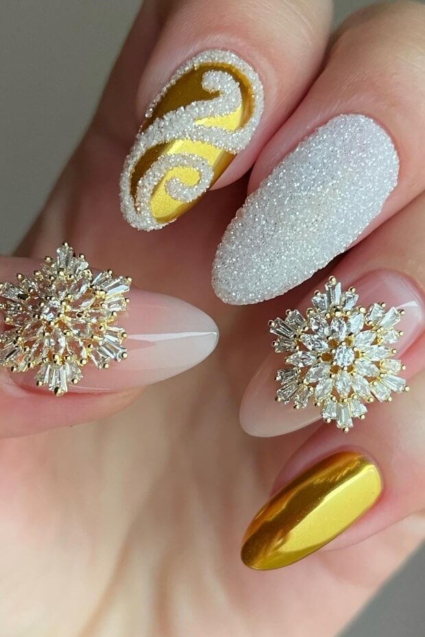 Gold snowflake nail art design