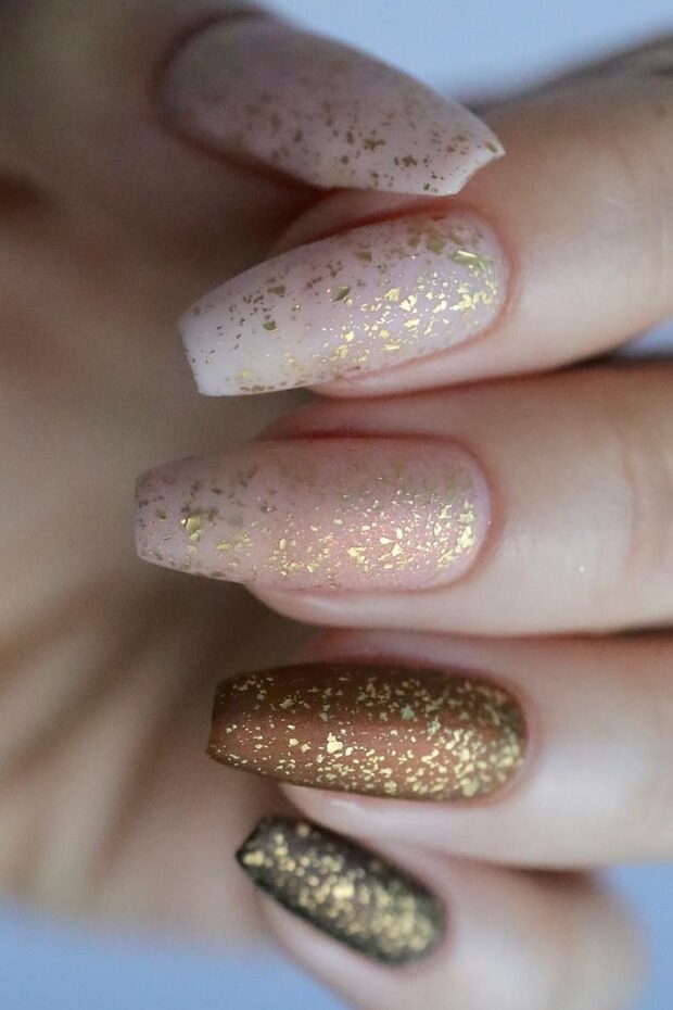 Gradient gold and brown with glitter nail art design