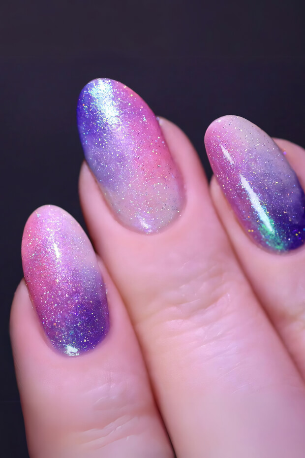 Gradient effect with purple and pink hues and glitter