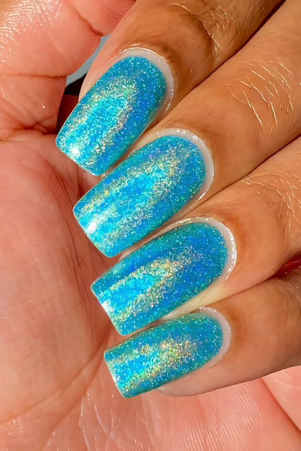 Blue and green holographic polish with shimmering effect