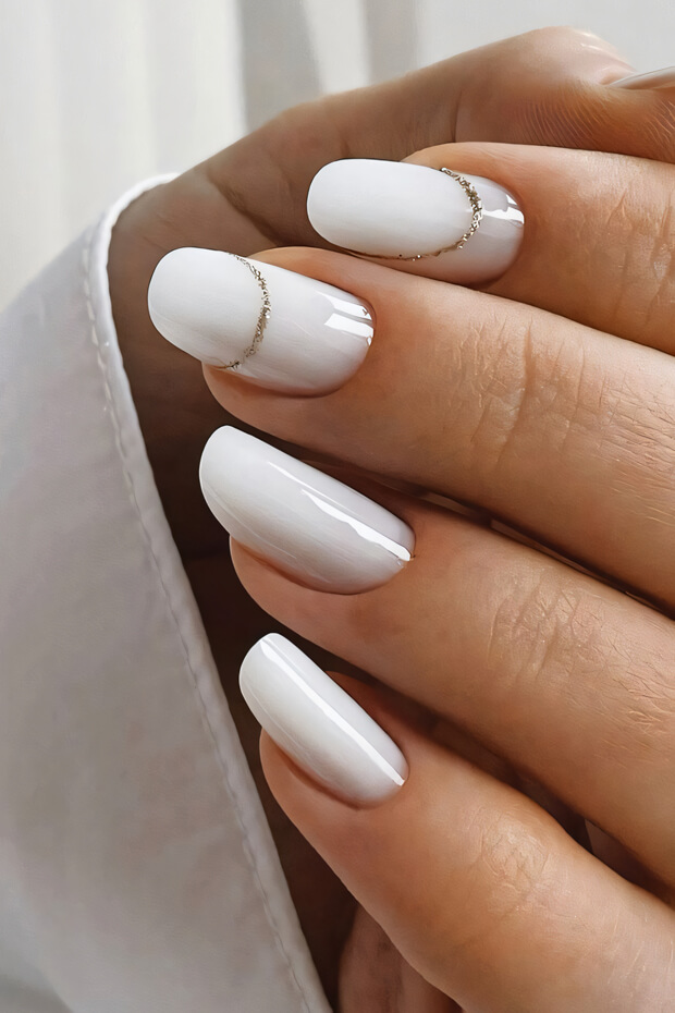 Milky White Nails with Gold Stripe Accent