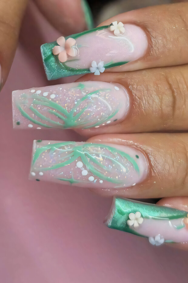 Pink and green nails with delicate flowers and leaves