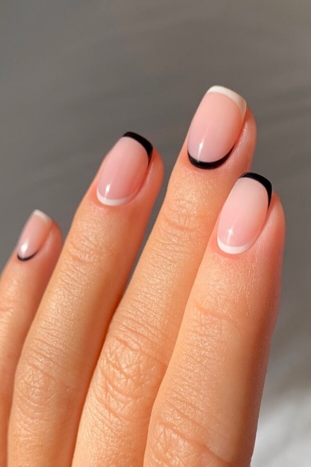 Black and white French manicure with subtle gradient