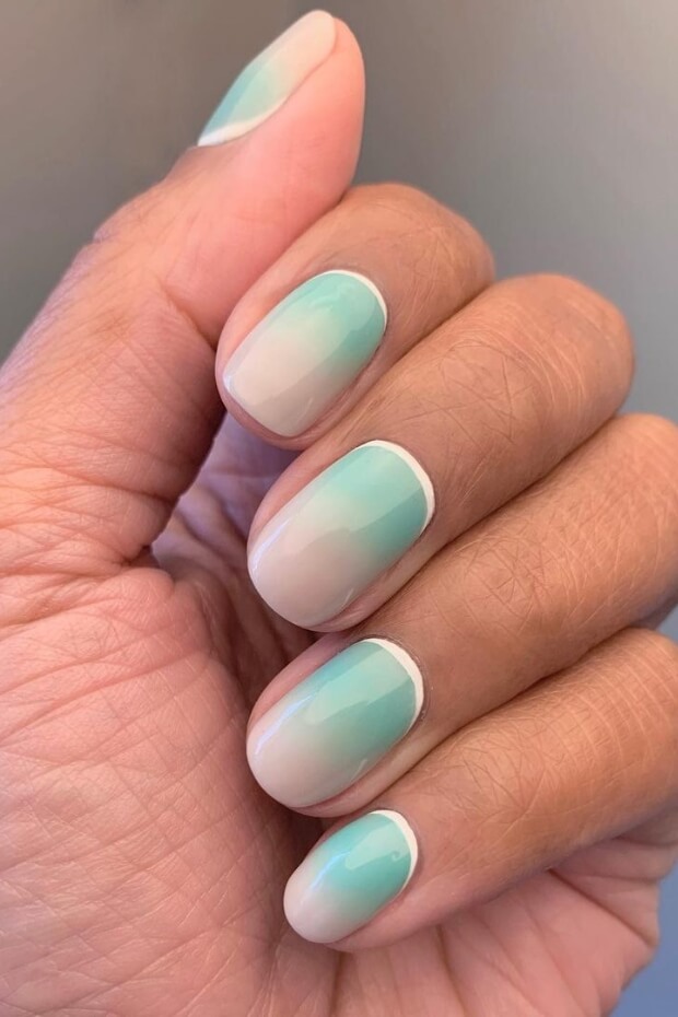 Gradient of blue, green, and white