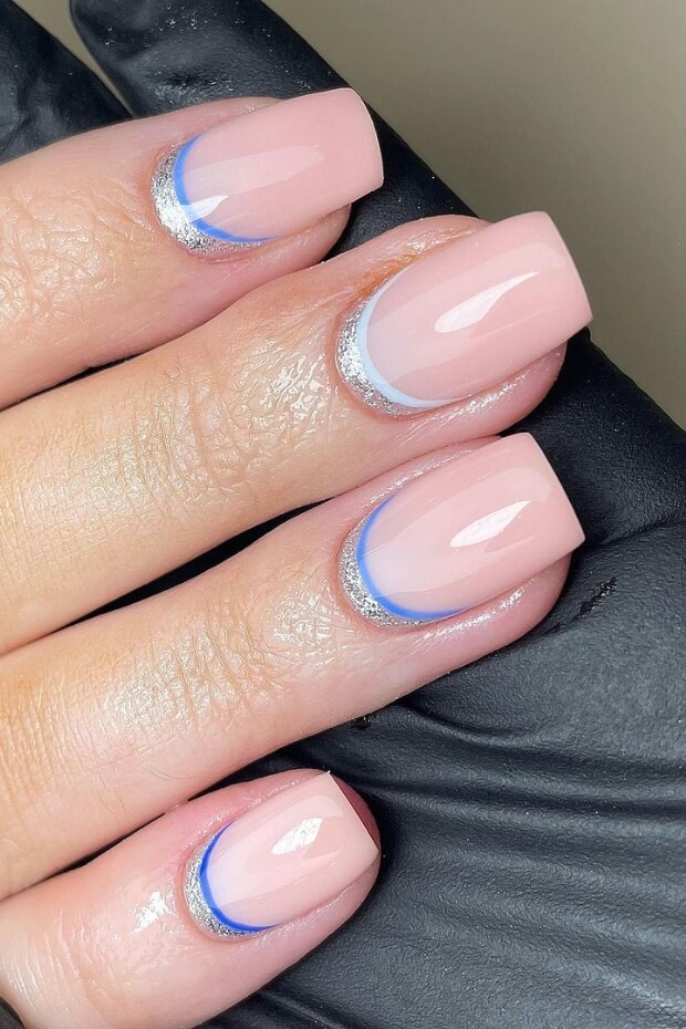 Pink nails with blue-silver ombre and silver crescent moon