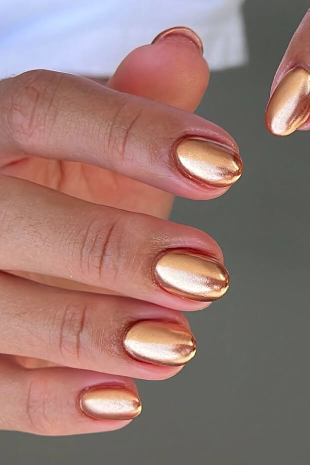 Shiny rose gold metallic nail design