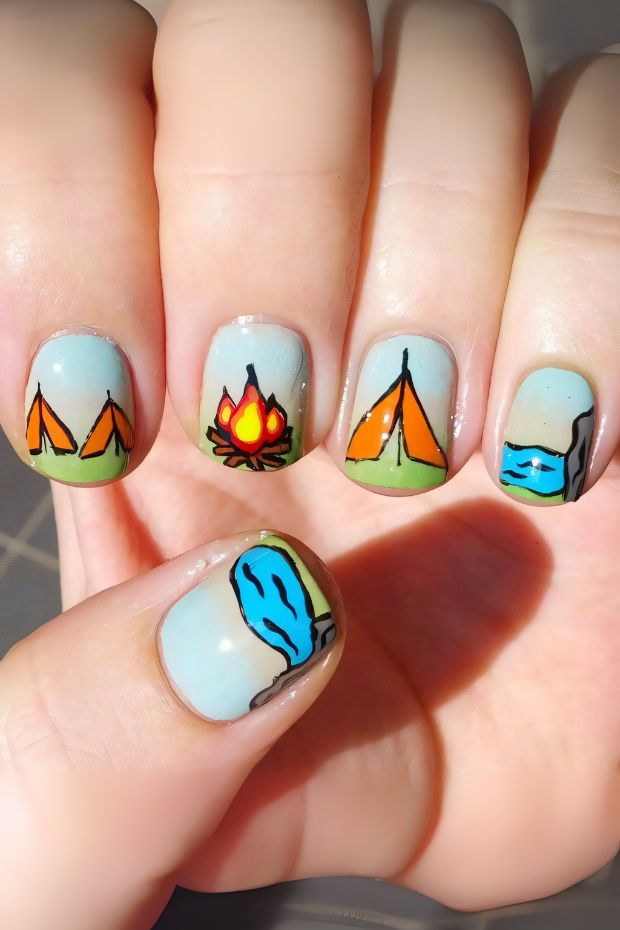 Camping-themed nails with tents, campfire, and lake artwork in vibrant colors for nature lovers.