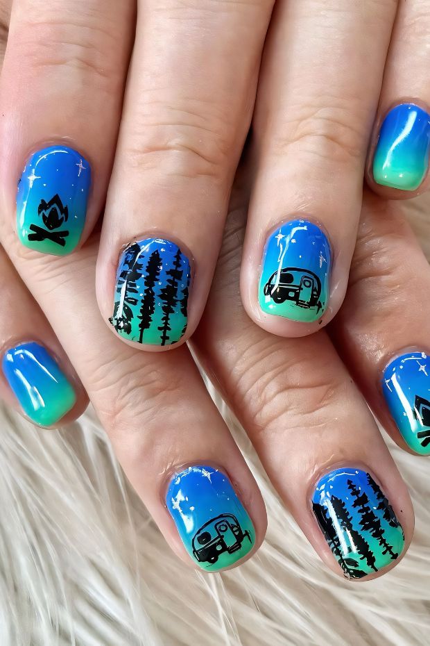 Camping nails featuring gradient colors, pine trees, and a vintage camper nail art design.