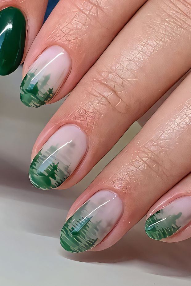 Camping nails featuring ombre forest landscape designs in green tones for outdoor enthusiasts.