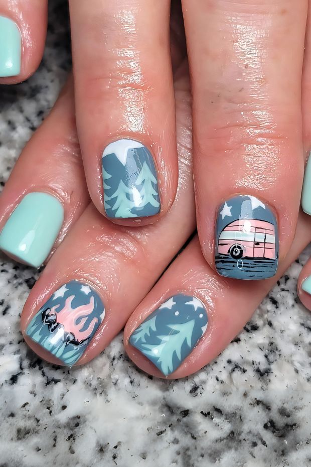 Camping nails with trees, a retro camper, and vibrant flames in various colors for outdoor enthusiasts.