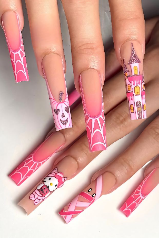 Vibrant pink nail designs featuring whimsical characters like a castle, unicorn, and Hello Kitty with intricate details.